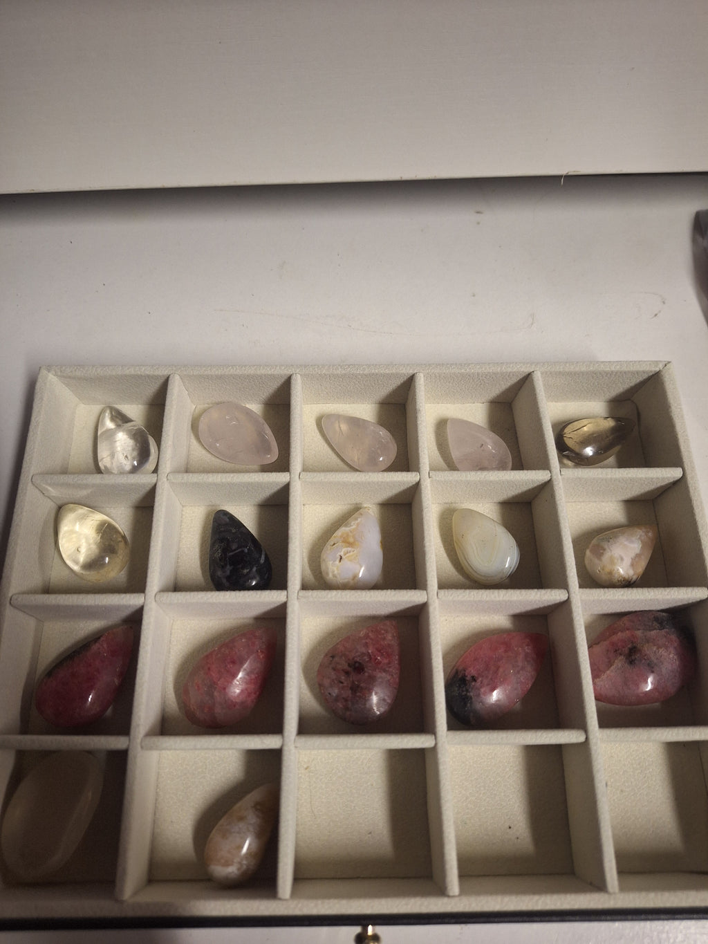 Minature carvings including tumble stones