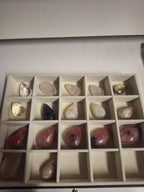 Minature carvings including tumble stones