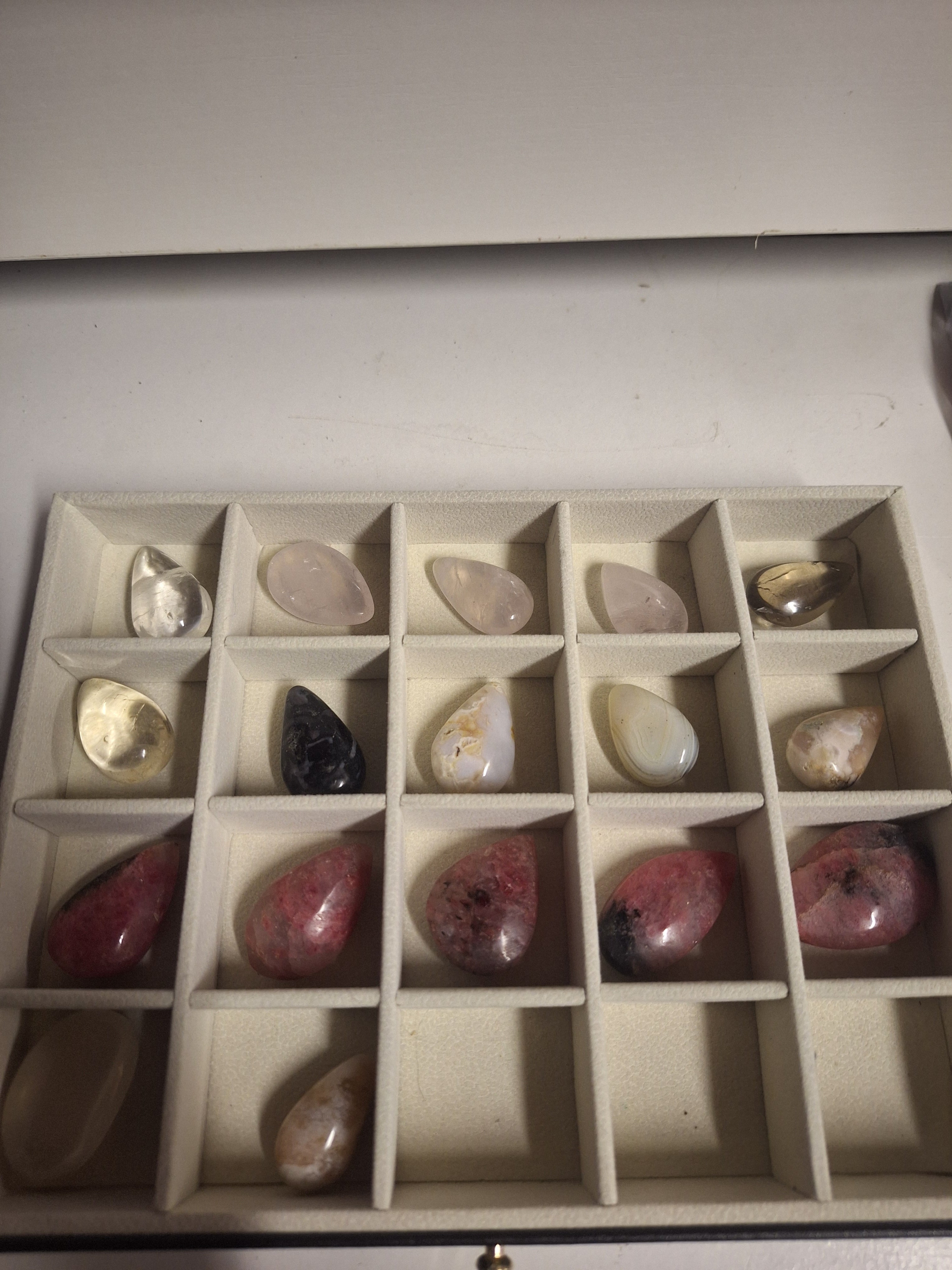 Minature carvings including tumble stones
