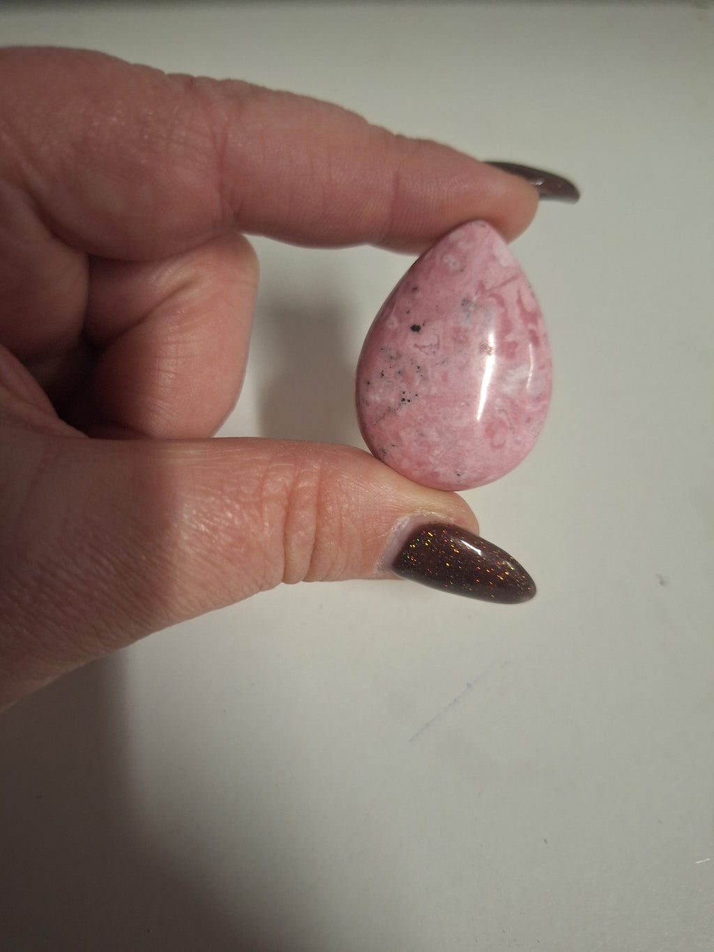Minature carvings including tumble stones