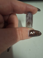 Minature carvings including tumble stones