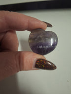 Minature carvings including tumble stones