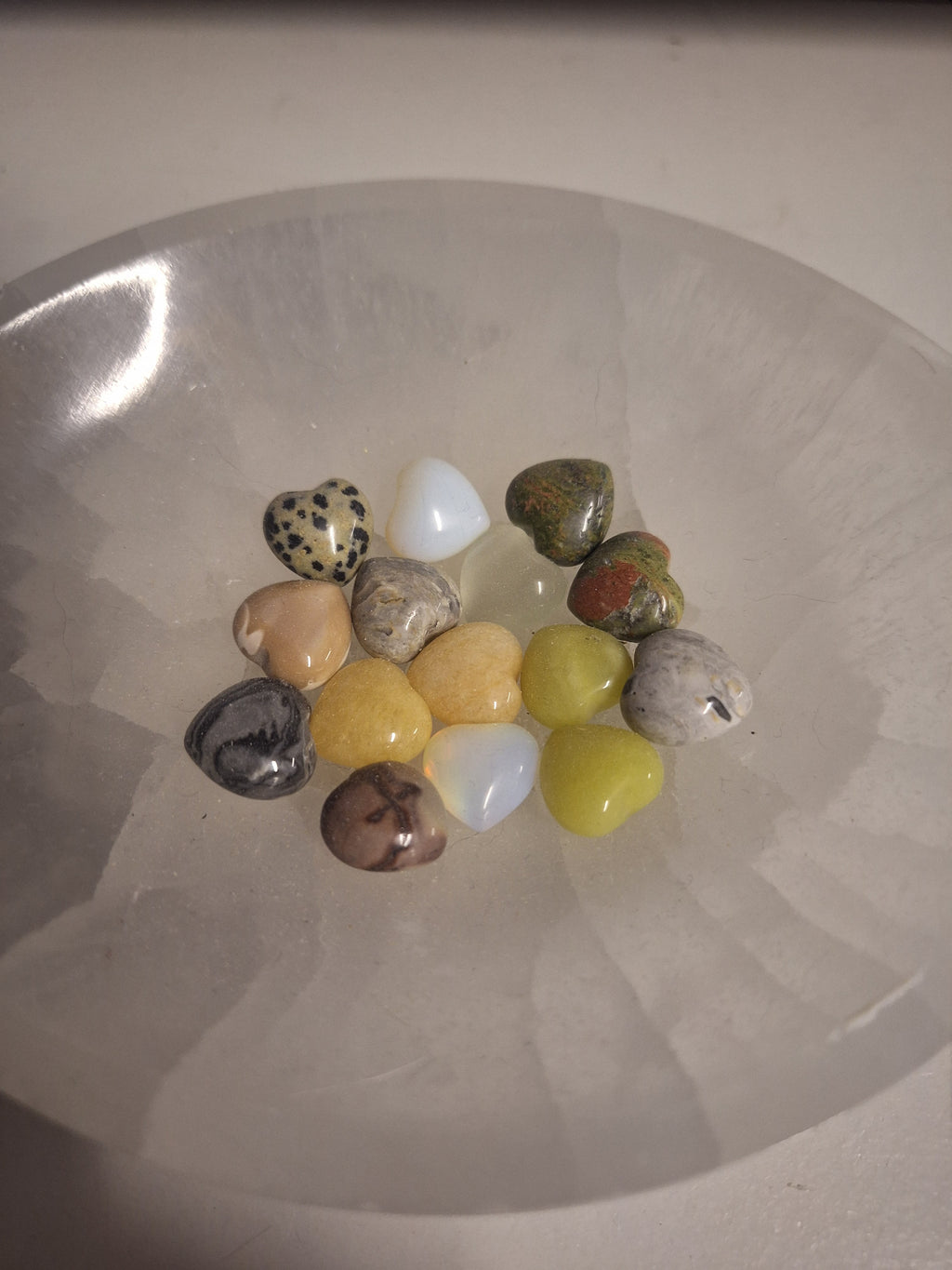 Minature carvings including tumble stones