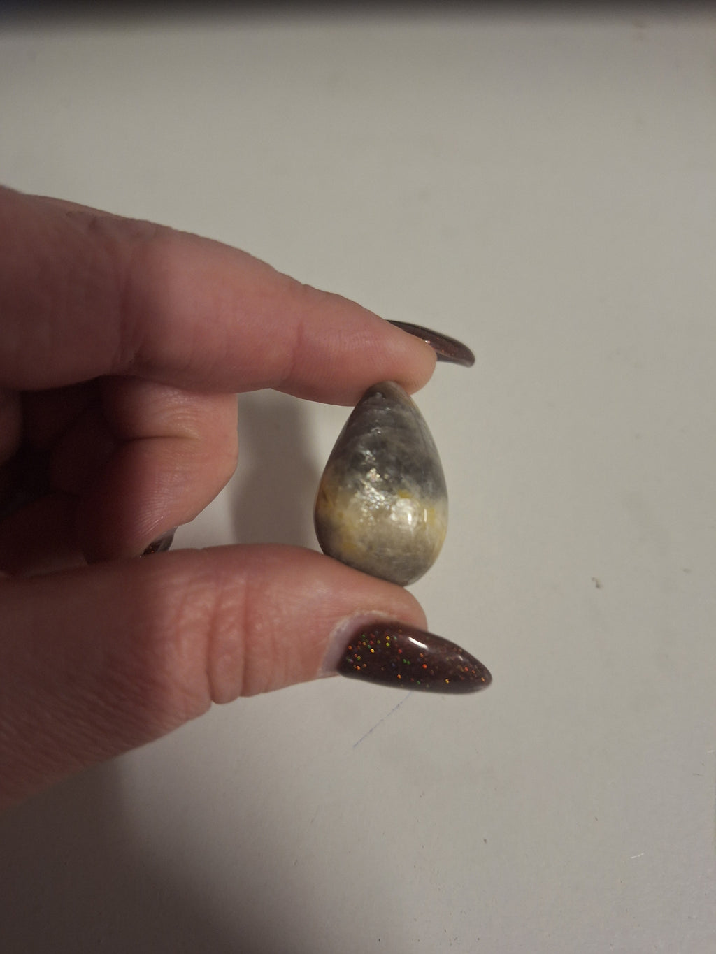Minature carvings including tumble stones