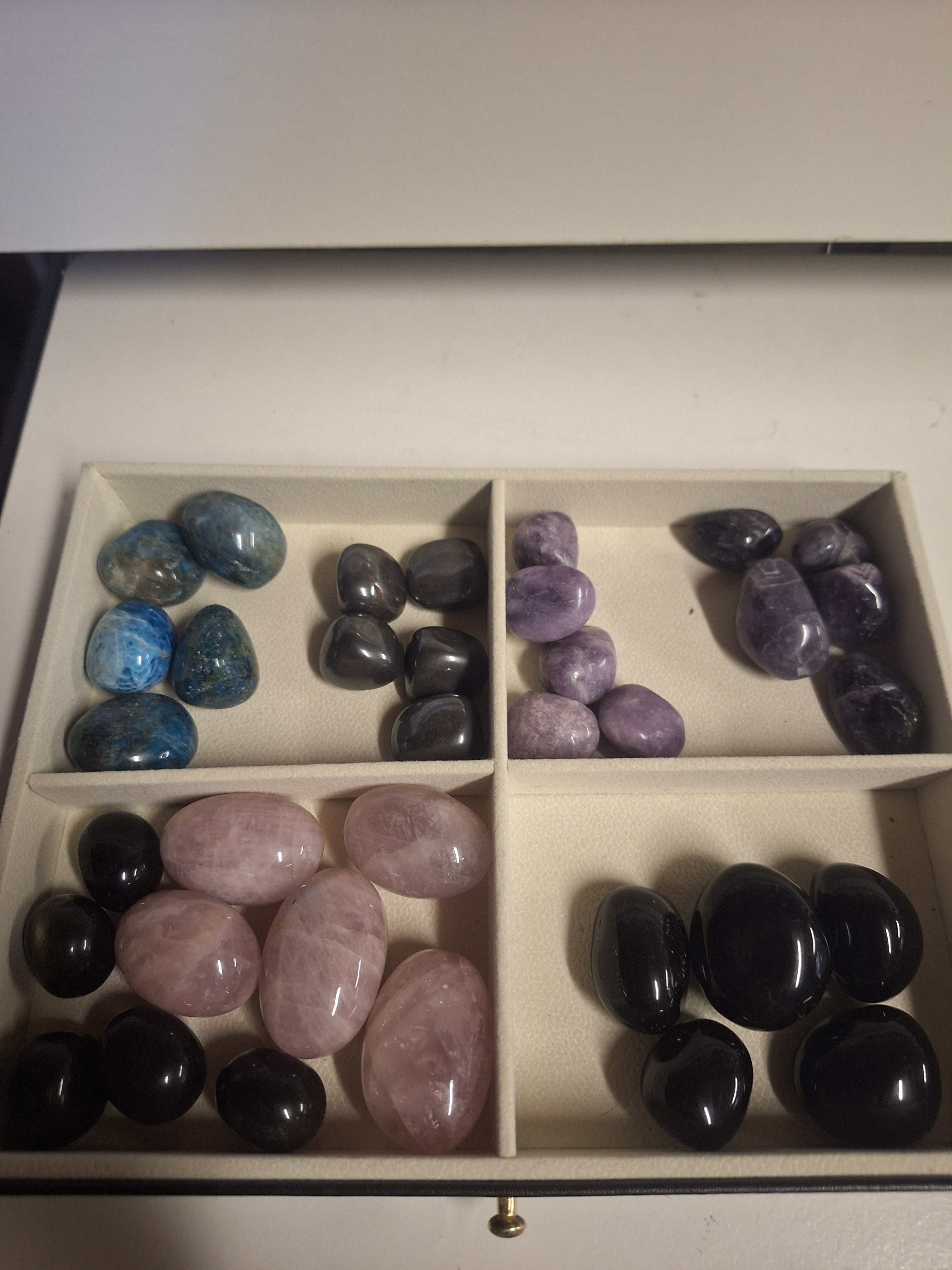 Minature carvings including tumble stones